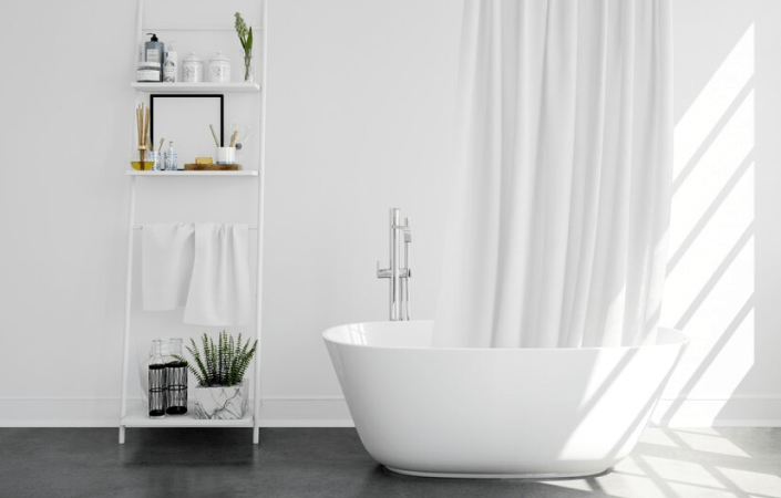 A pretty white bathroom with a standalone tub